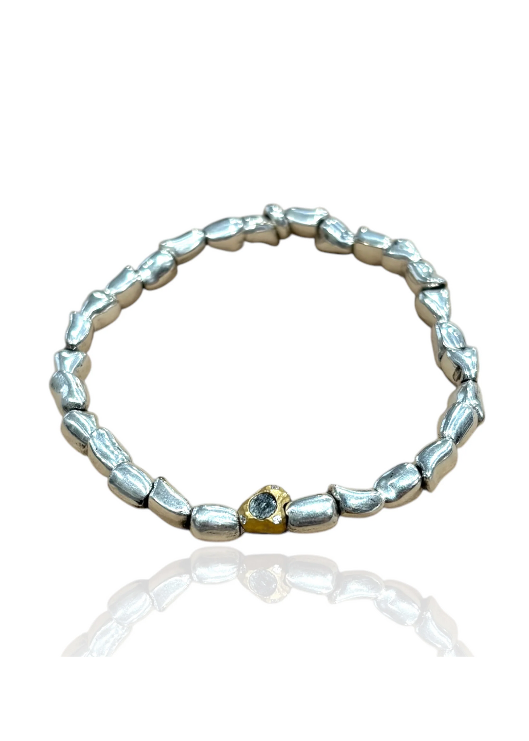 Women's vintage silver nugget bracelet with a gold accent bead