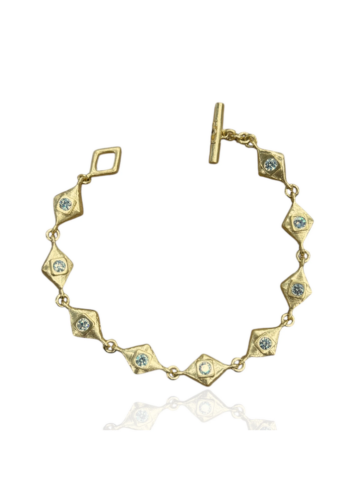 Women's gold diamond shaped tennis bracelet with round CZ centers