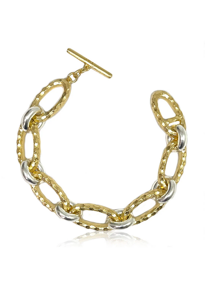 Women's hammered gold and silver chain bracelet with a toggle clasp