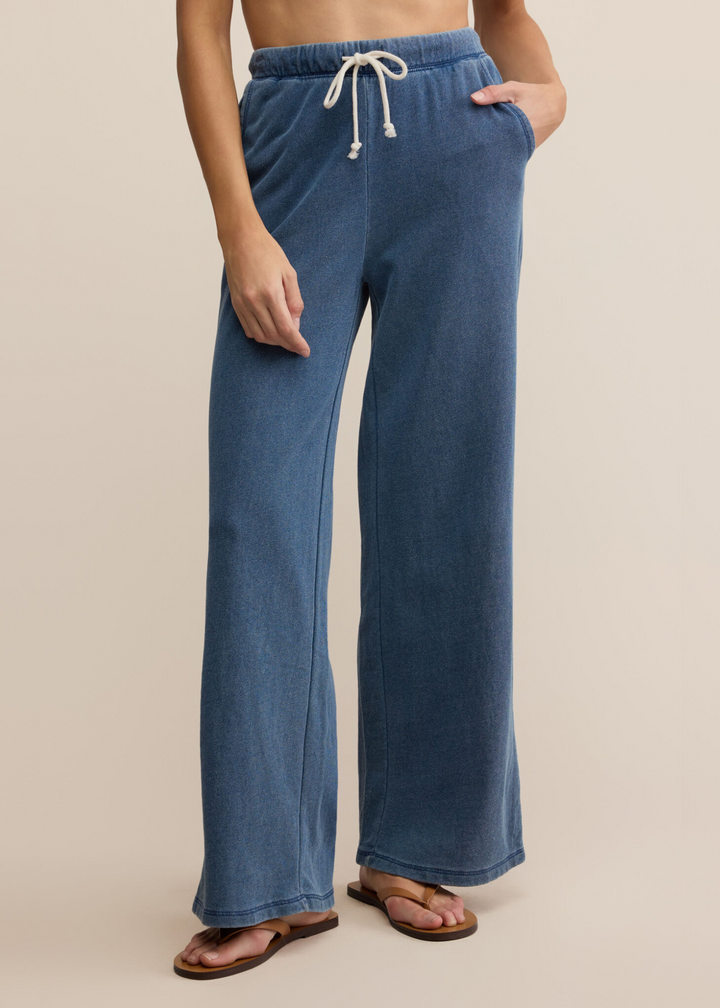 Woman wearing denim knit pants