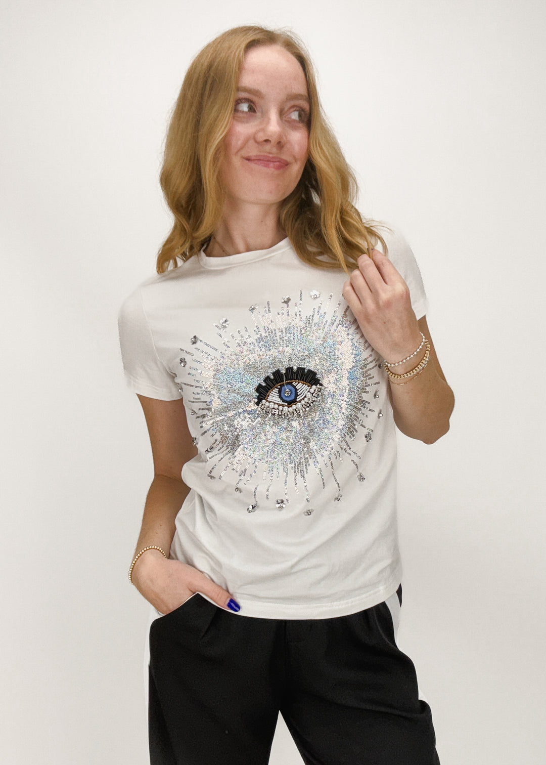 White short sleeve tee with crystal beaded evil eye chest graphic