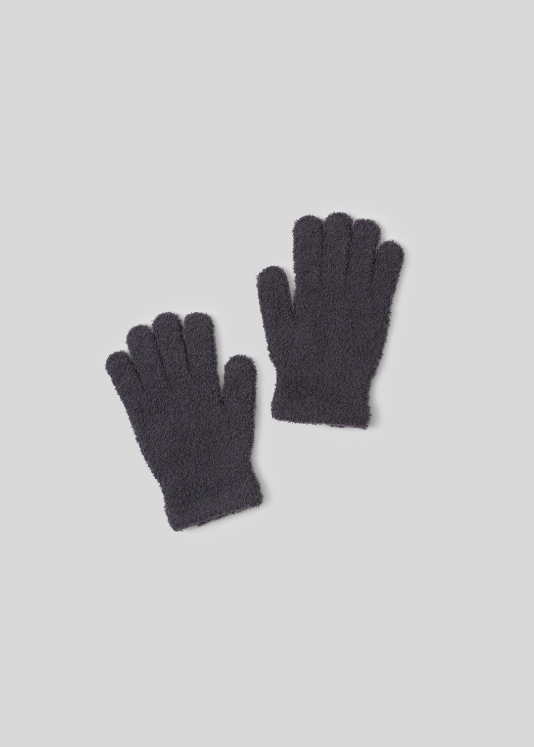 Women's charcoal grey fuzzy gloves laying on a white background