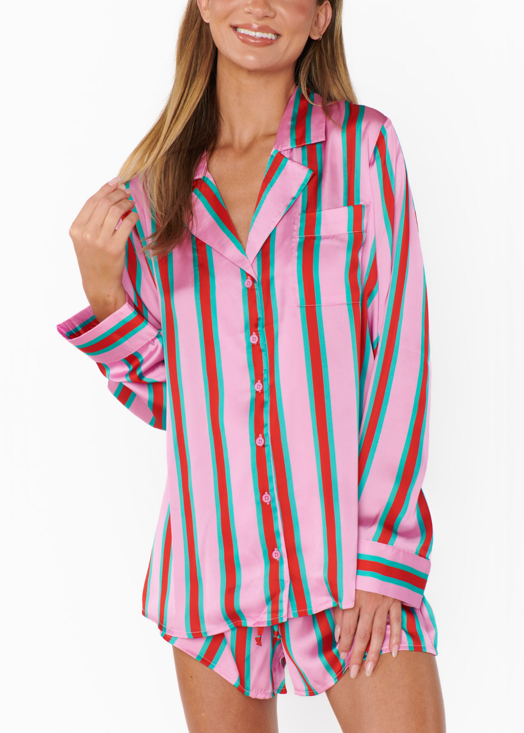 A woman wearing the Show Me Your Mumu Beauty Sleep pajamas in front of a white background