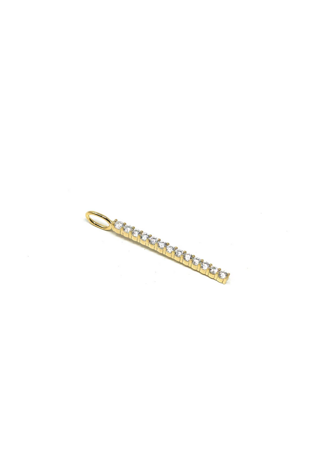 Gold charm with crystals on a white background