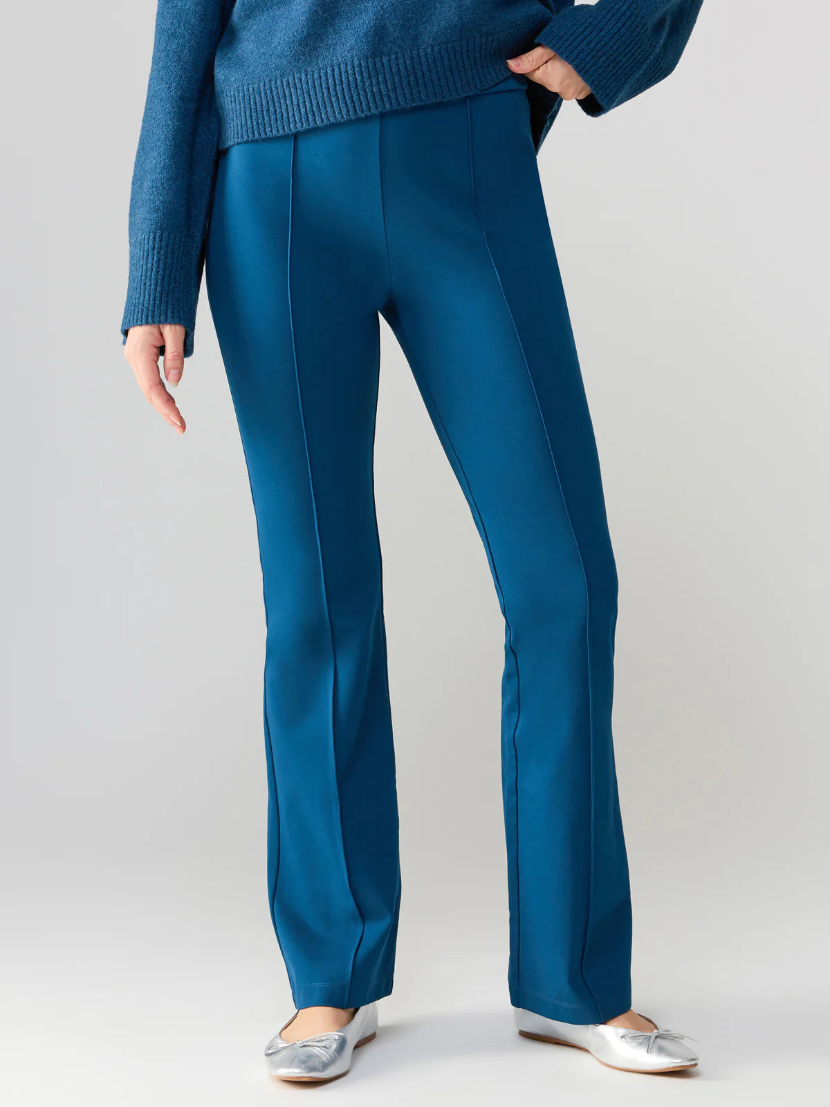 blue jewel toned fitted flare pants with front pin tuck