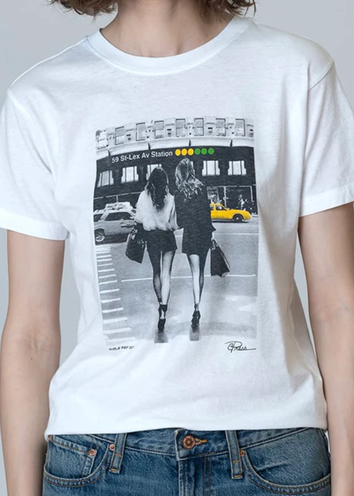 Woman wearing a graphic tee with jeans