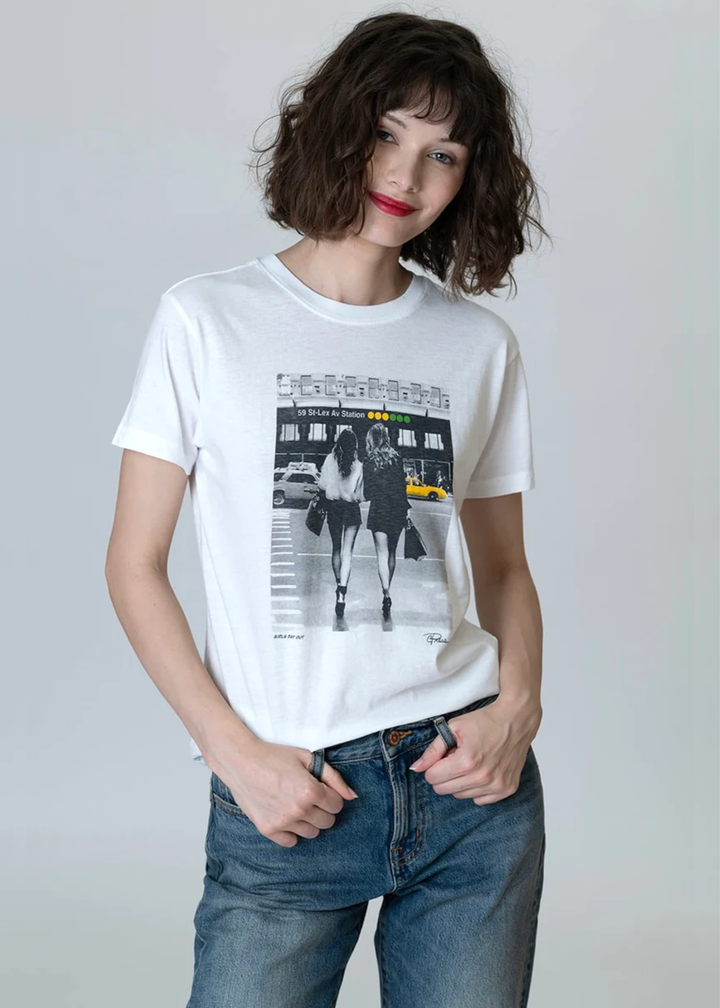 Woman wearing a graphic tee with jeans