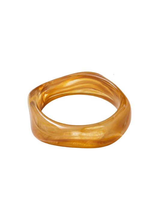 Brown geometric shaped bangle bracelet on a white background