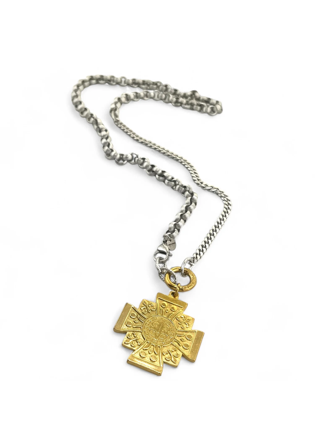 Silver chain necklace with a gold cross pendant on a white background