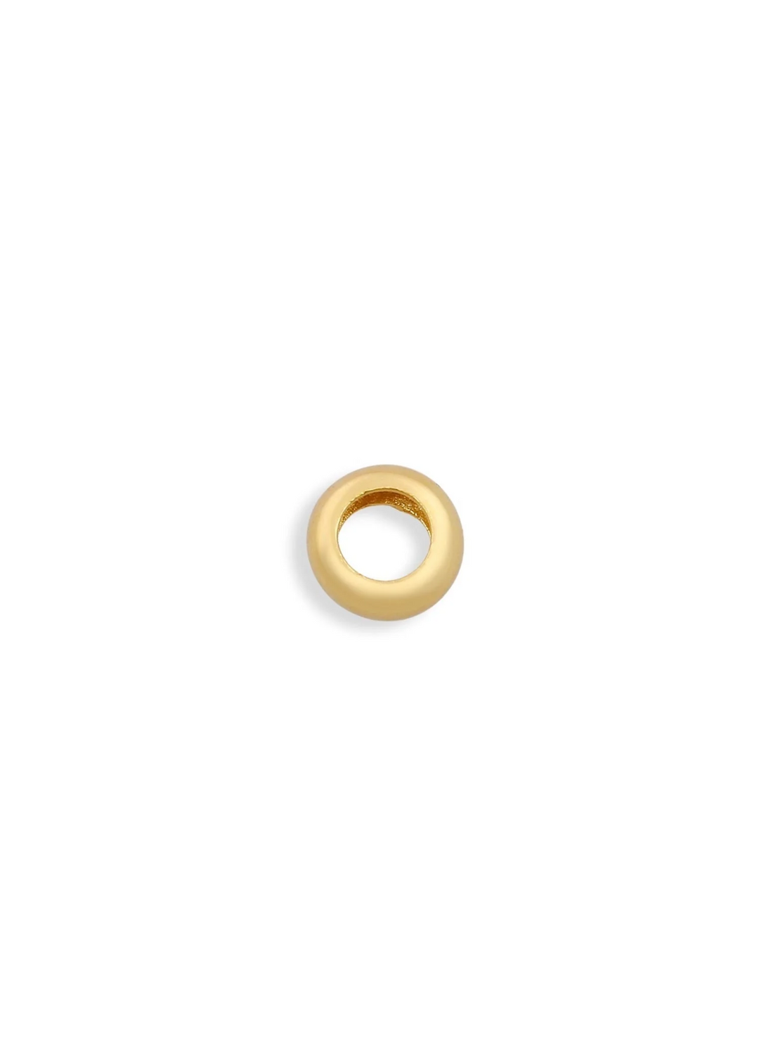 A gold spacer charm on a white background