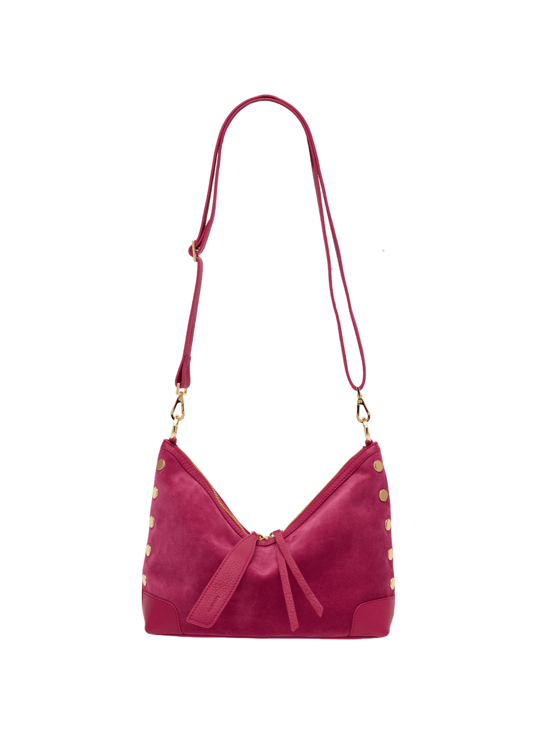 Fuschia suede and leather handbag with gold accents against a white background