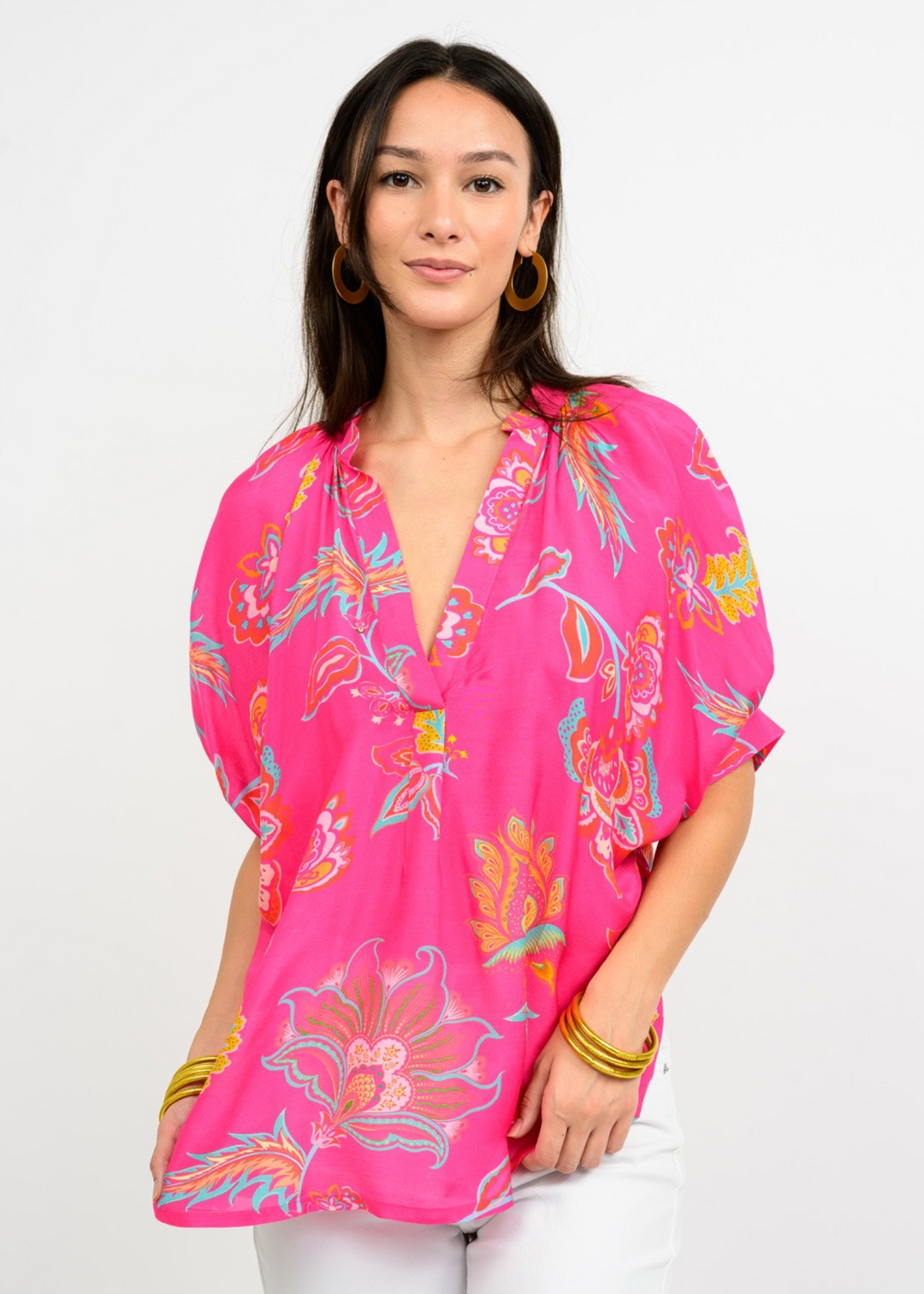 woman wearing pink floral v neck top