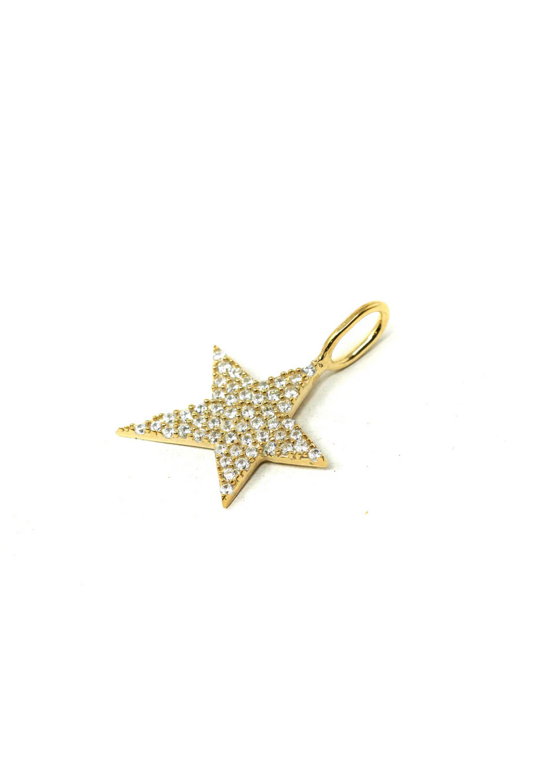 A gold star charm with crystals on a white background