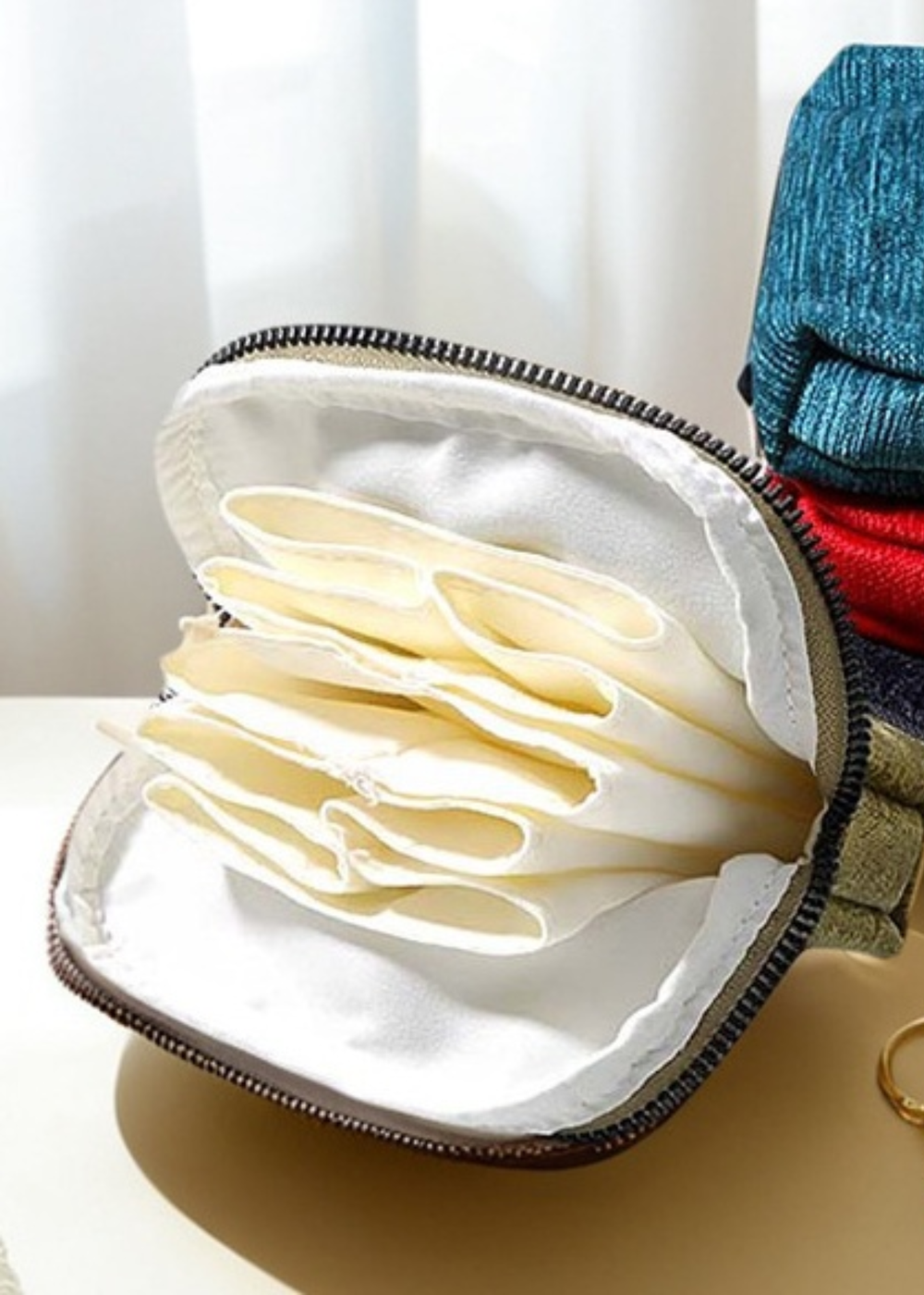 Inside of a jewelry organizer with pockets