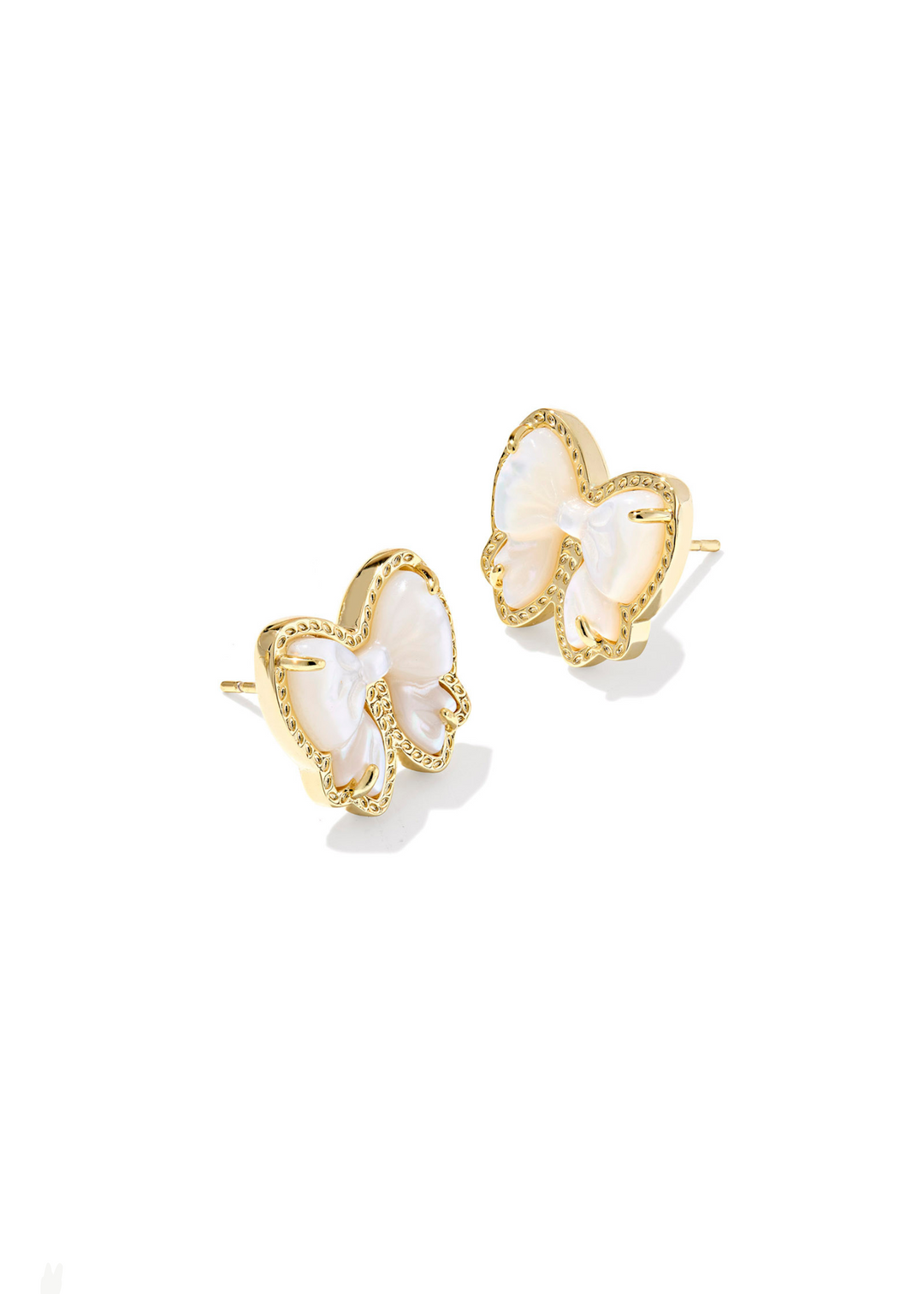 Women's gold bow shaped stud earrings with an ivory center stone