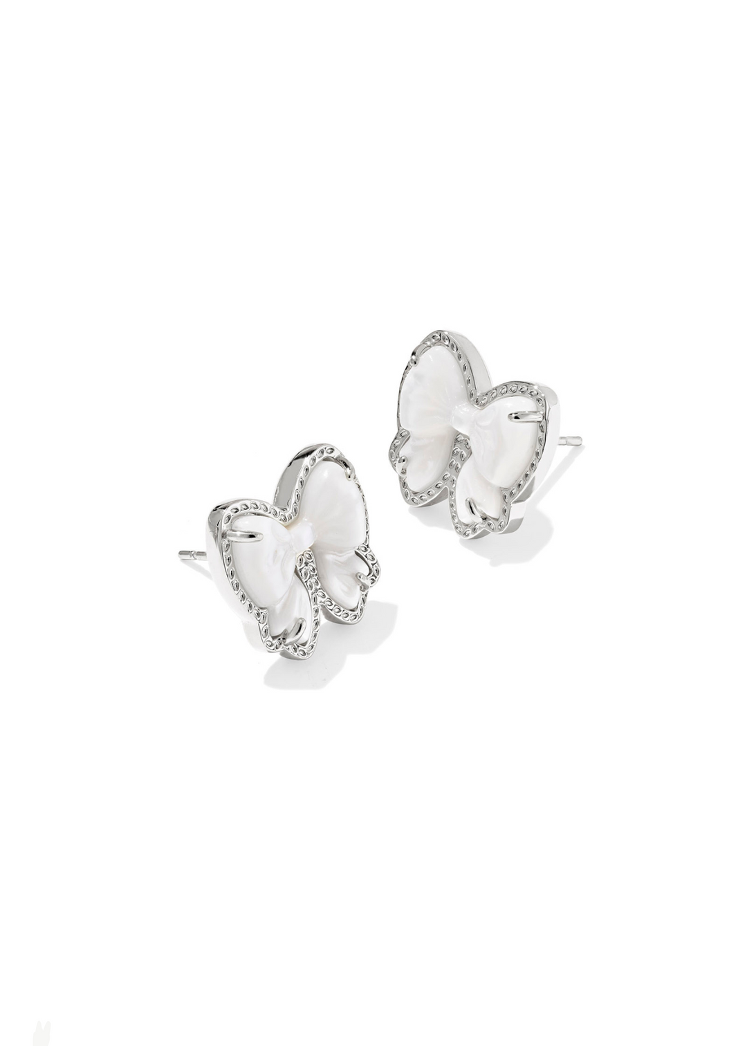 Women's silver bow shaped stud earrings with a white stone