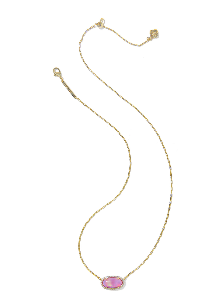 Gold necklace with a pink pendant framed with CZs against a white background