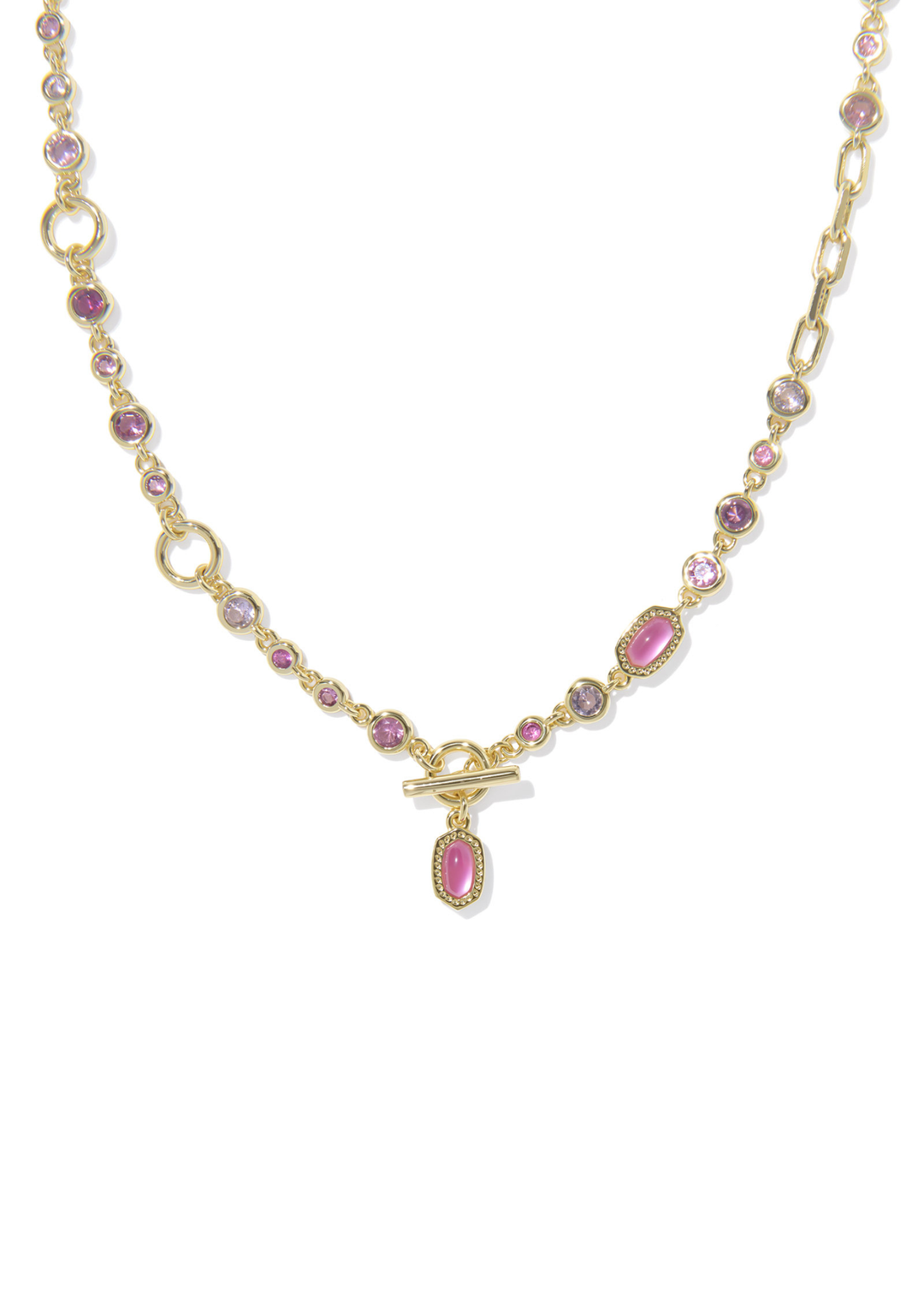 Gold necklace with pink stones against a white background