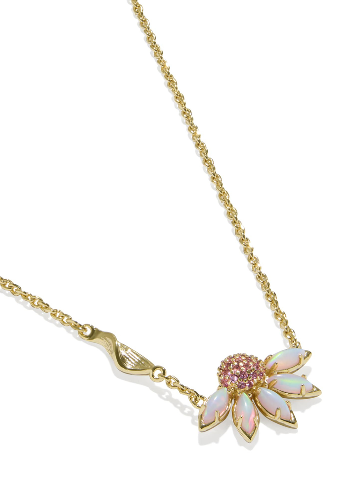 Gold necklace with a pink and white flower pendant