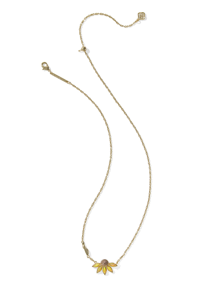 Gold necklace with a yellow flower pendant