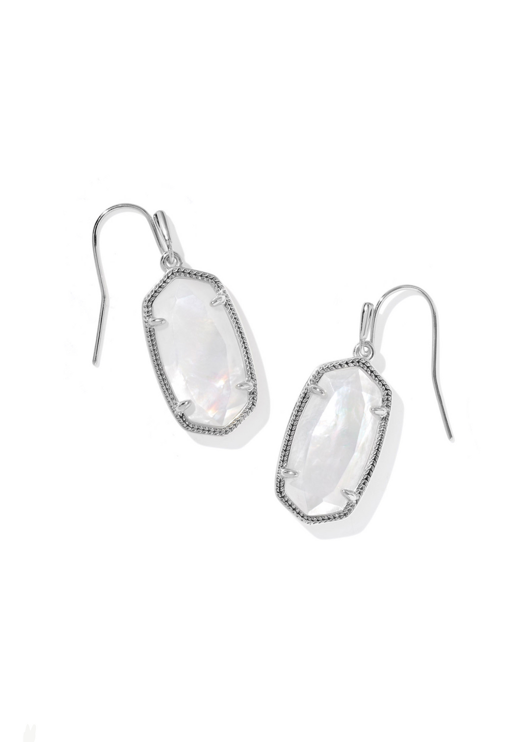Women's rhodium framed drop earrings with an ivory mother of pearl stone center on a white background