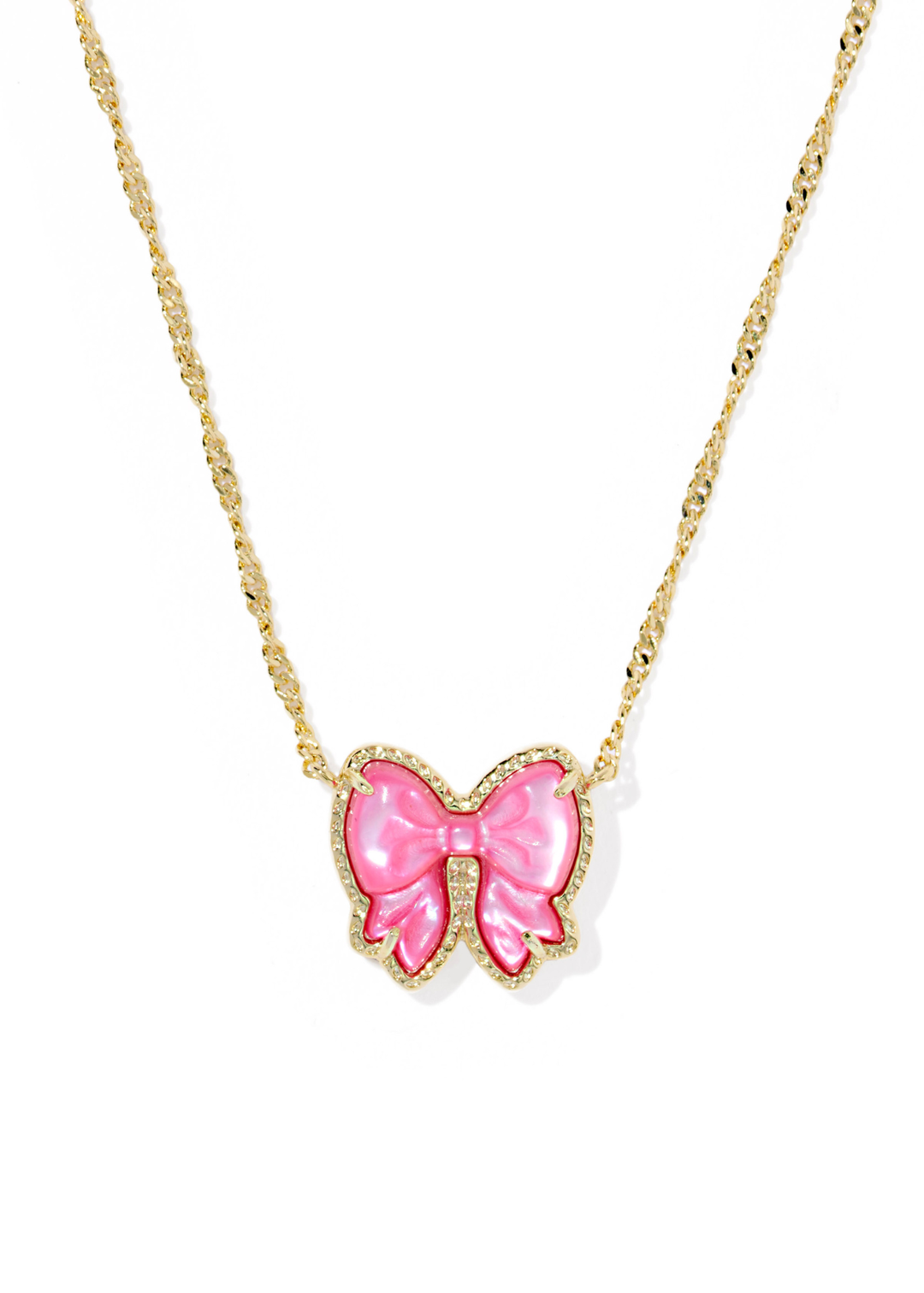 Gold necklace with a pink bow pendant on a white background