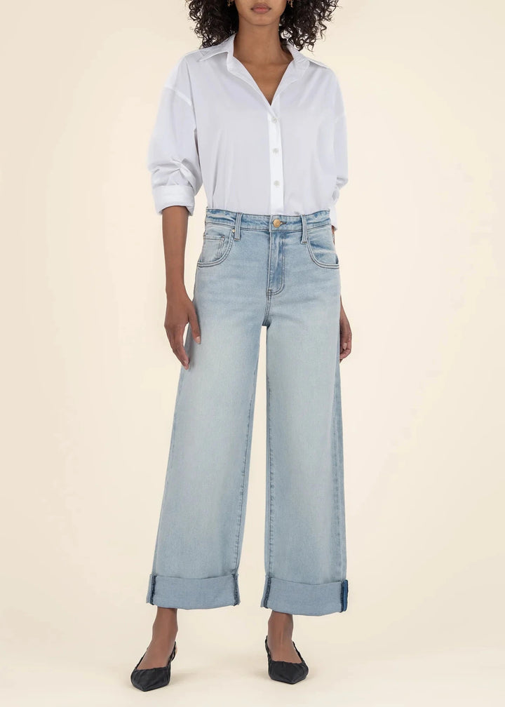 light wash high rise wide leg denim jeans with roll cuff