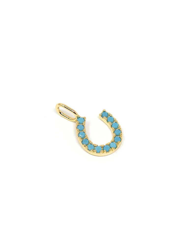 Gold horseshoe charm with turquoise beading on a white background