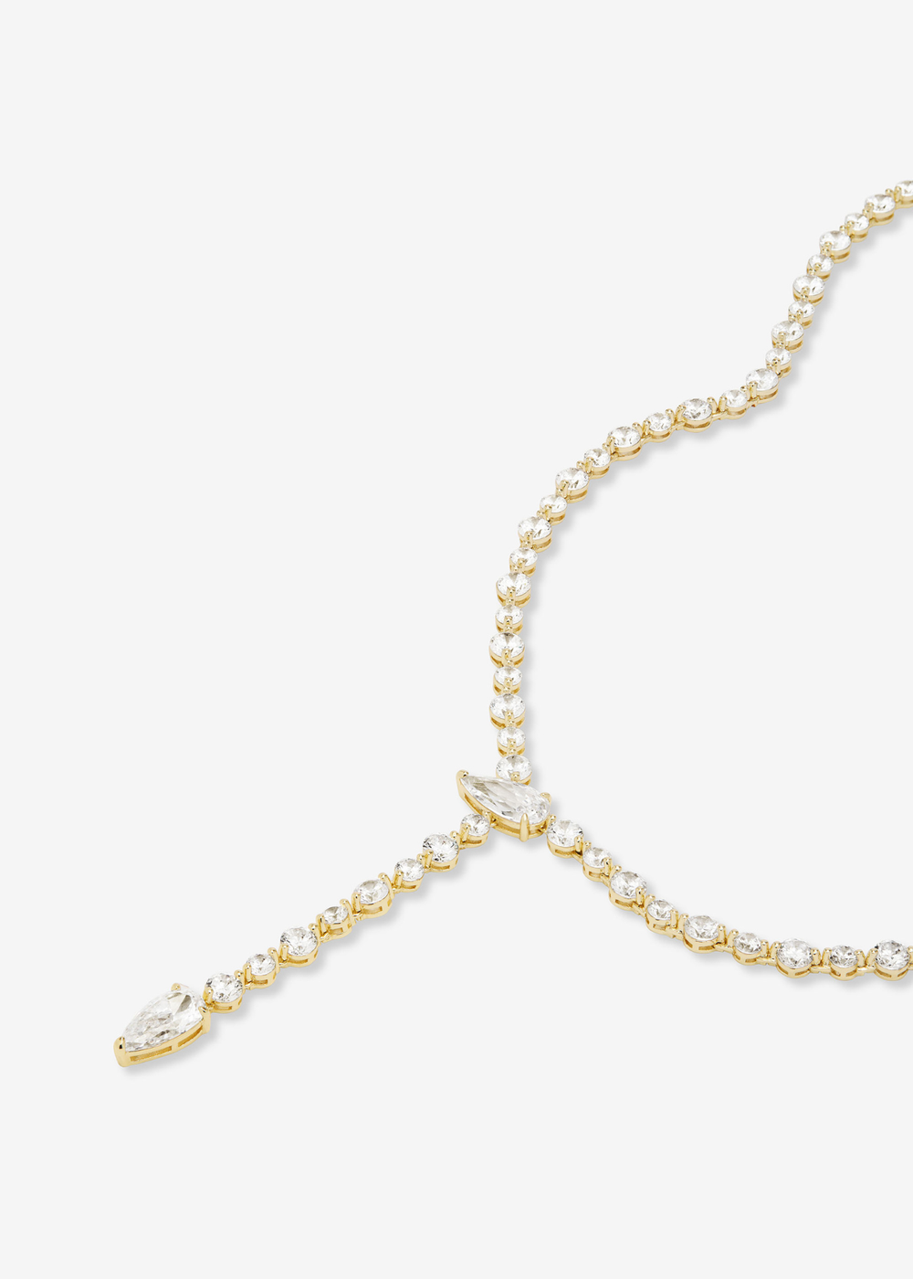 Gold simulated diamond tennis lariat necklace on a white background