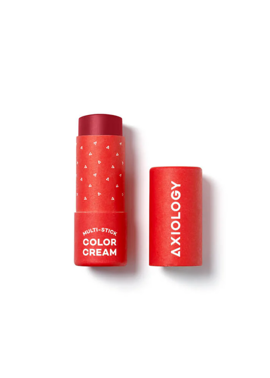 Makeup multi-stick in a red tube with white lettering on a white background