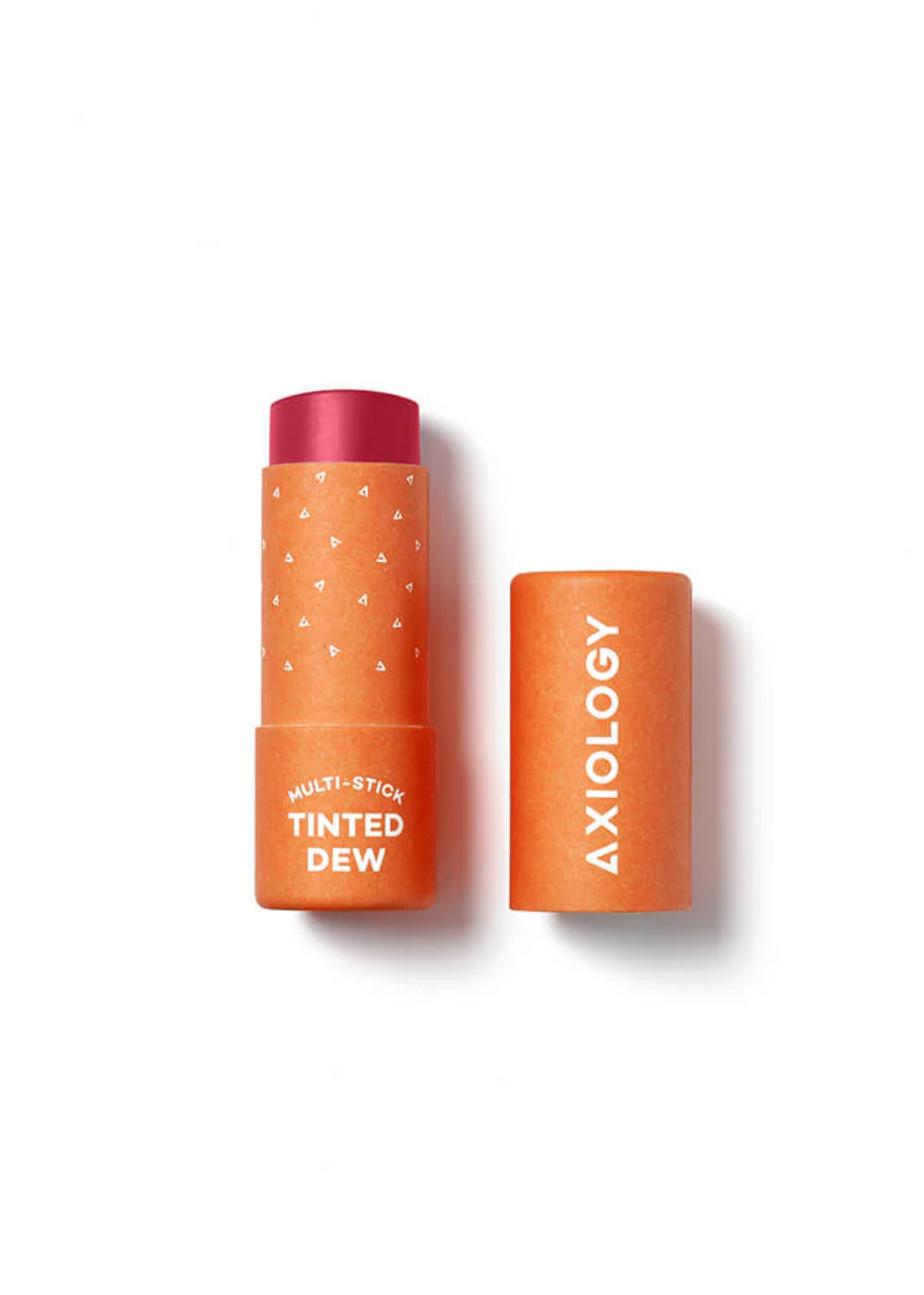 Makeup multi-stick in an orange tube with white lettering on a white background