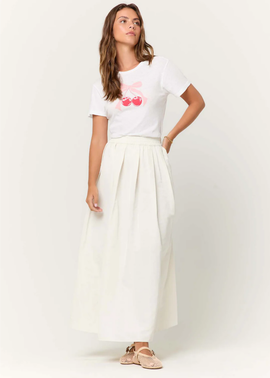 Project Social T white short sleeve graphic tee with cherry and bow chest graphic
