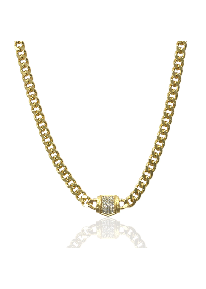 Gold chain necklace with a pave CZ pendant on a white background