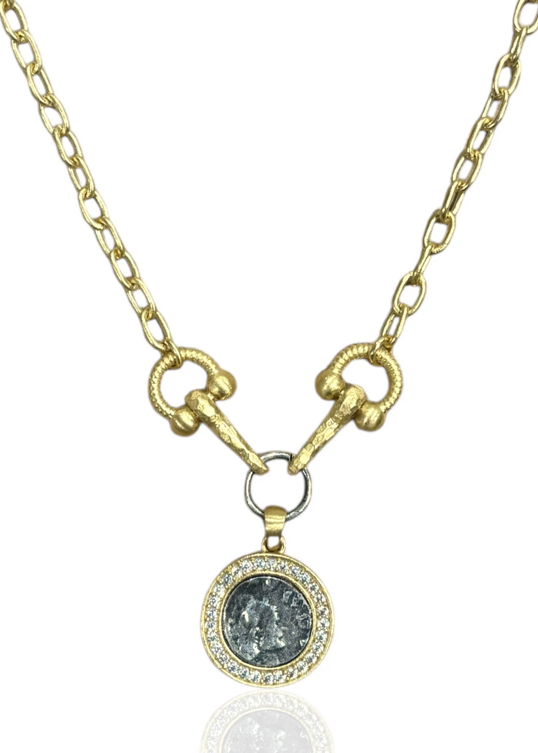 silver and gold mixed metal coin necklace with pave and horse bit details