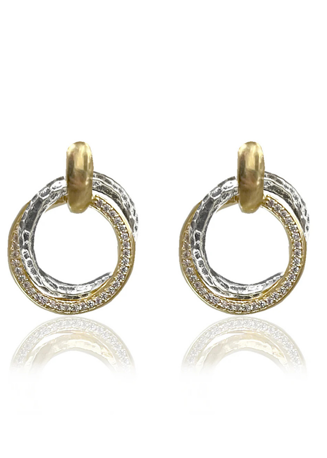 Mixed metal twisted circle earrings with CZ details on a white background