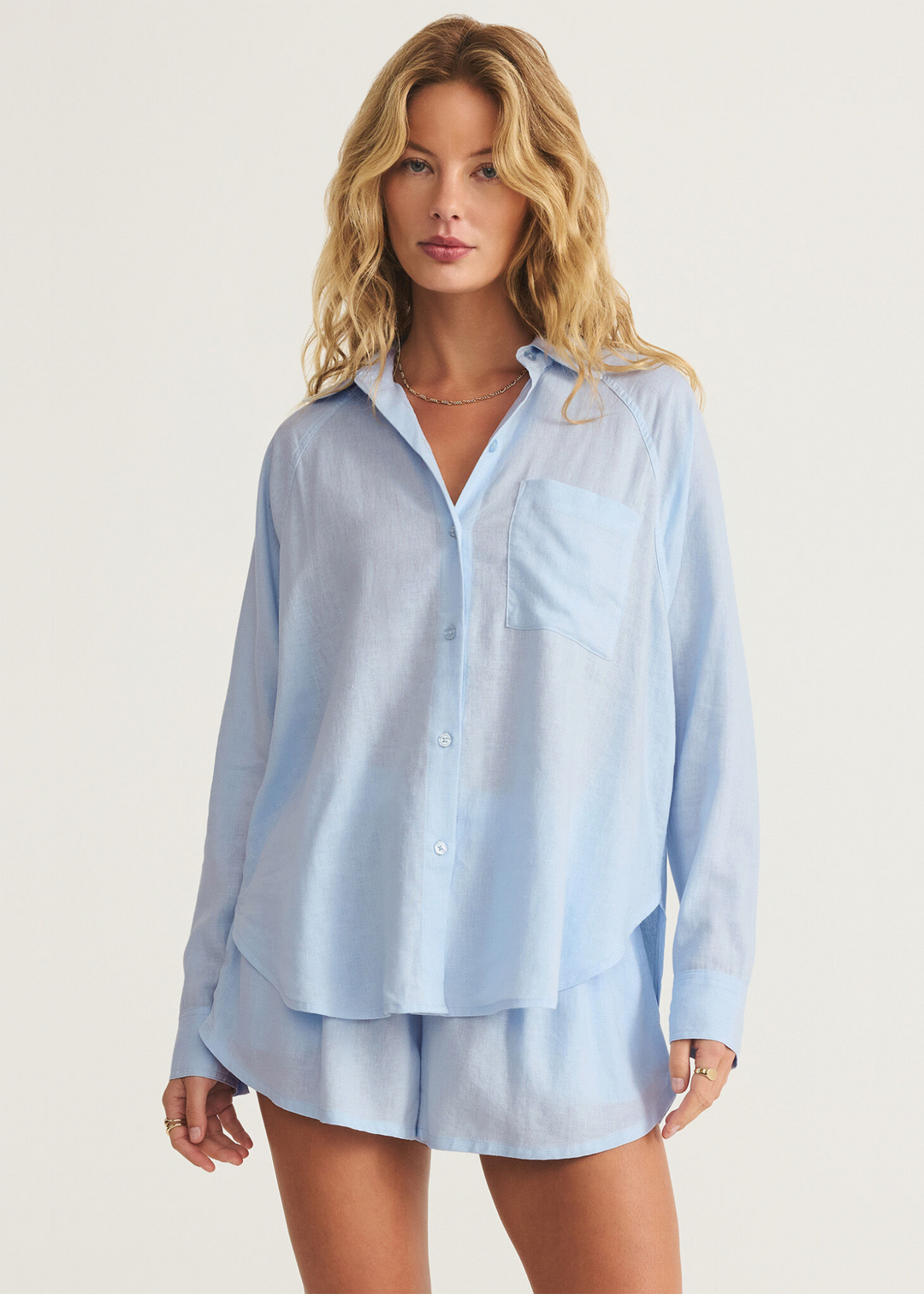 Collared long sleeve blue linen button down top