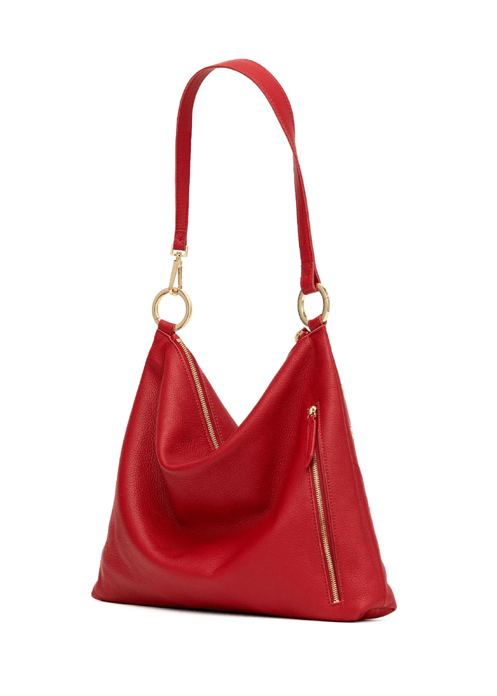 Red handbag with the handle up. 