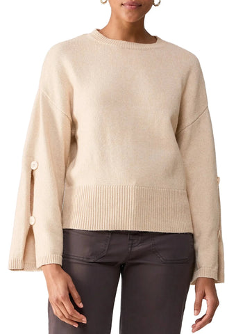 beige sweater with large rib hemline and split sleeves with buttons