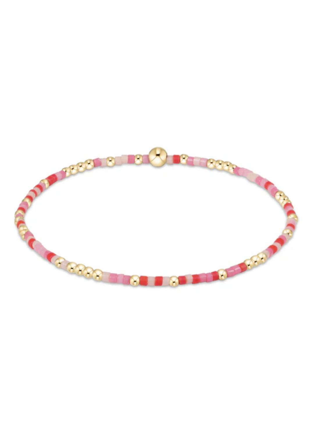 Little girls' beaded bracelet with various pink, red, and gold beads on a white background