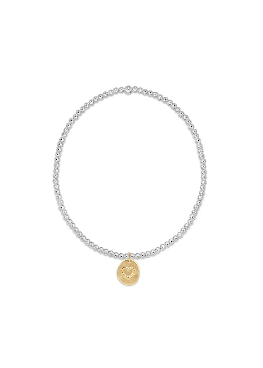 Silver beaded bracelet with a round gold heart charm on a white background