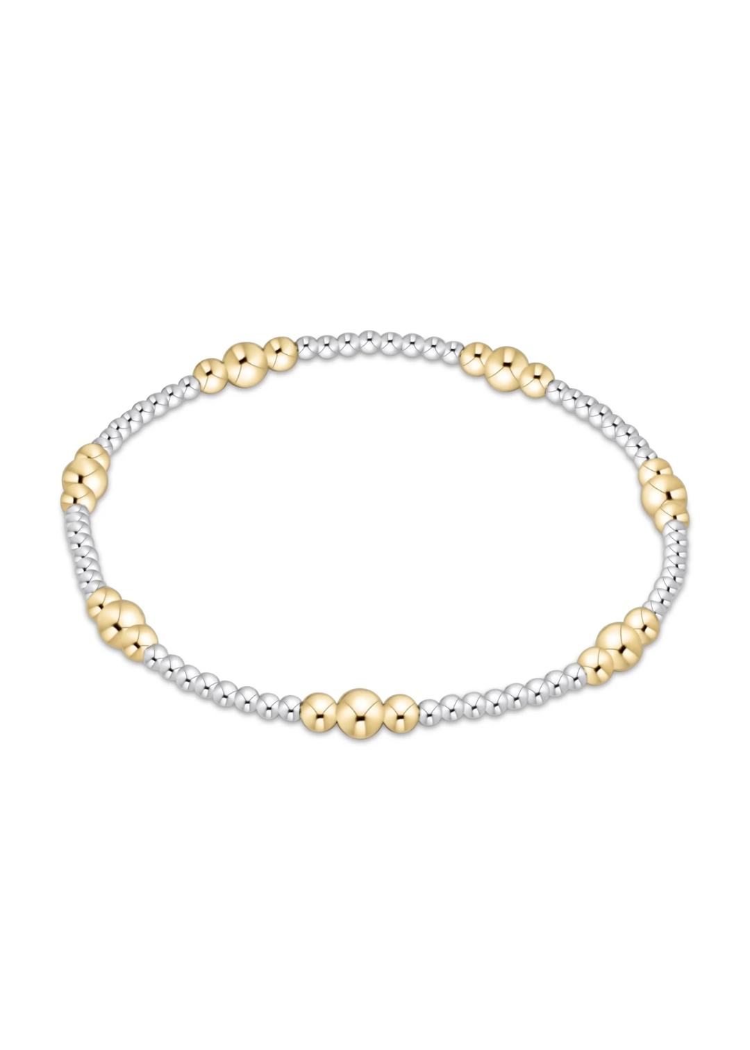 Gold and silver beaded bracelet on a white background
