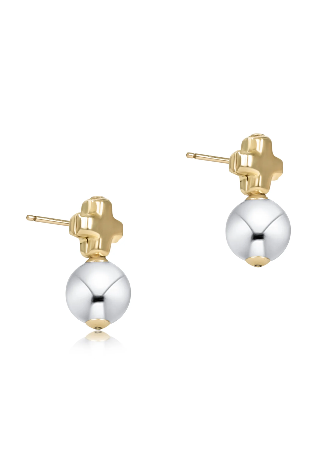 Gold cross stud earrings with sterling silver balls against a white background