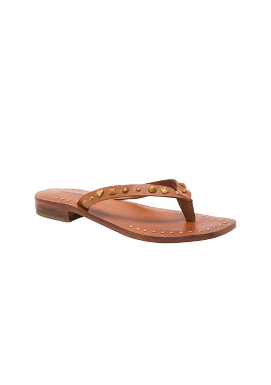 Brown sandal with gold studs on a white background