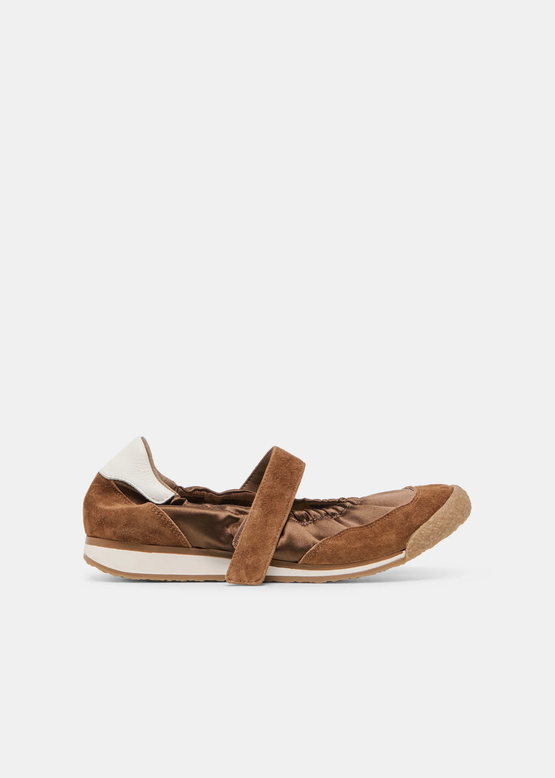 Brown sneaker/flat on a while background turned towards the side. 