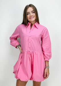 pink long sleeve 1/2 button front collared dress with dramatic puff skirt