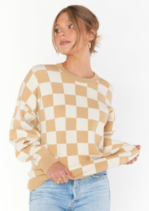 tan and white checkered sweater