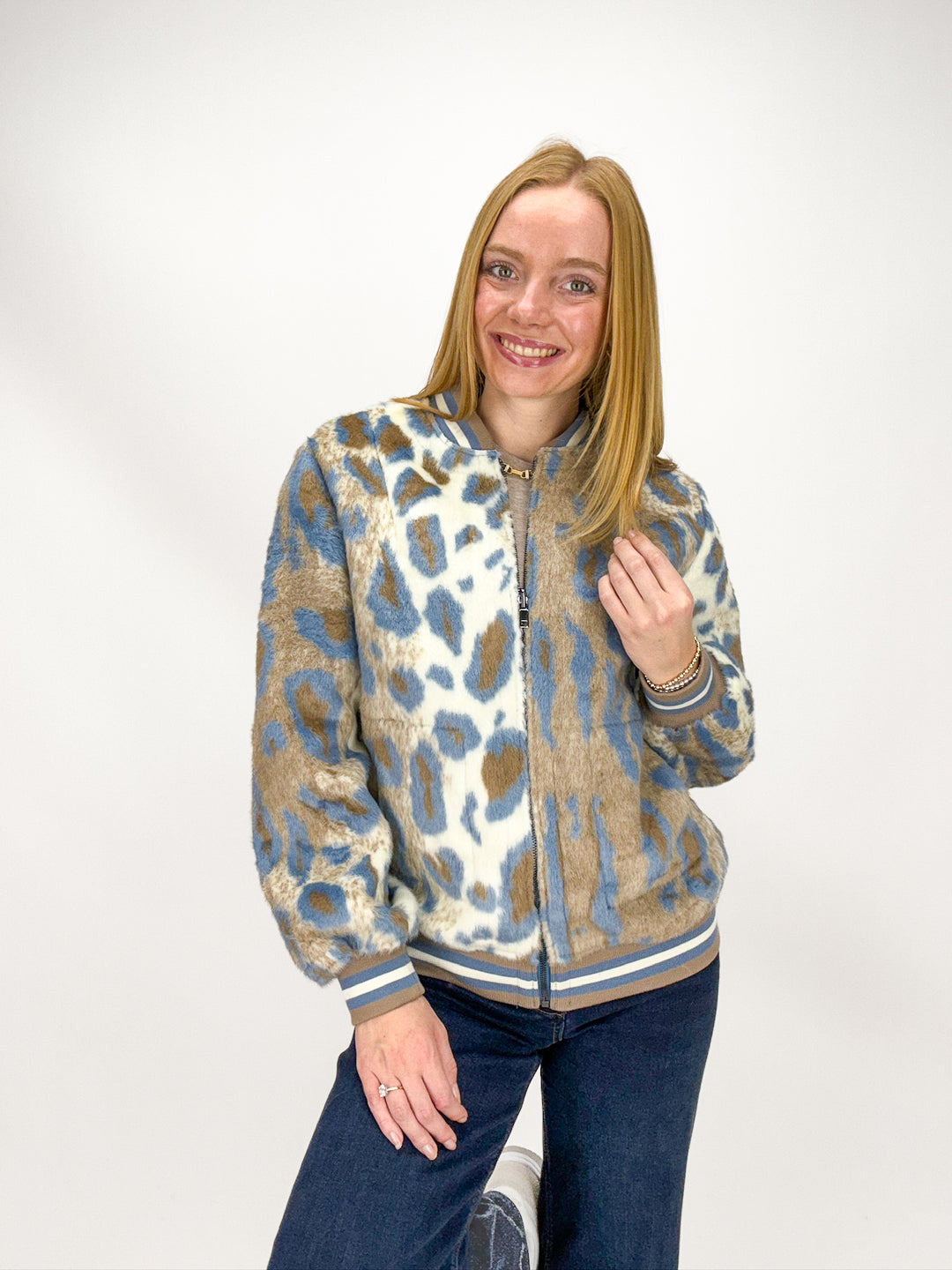 Woman wearing a leopard print jacket 